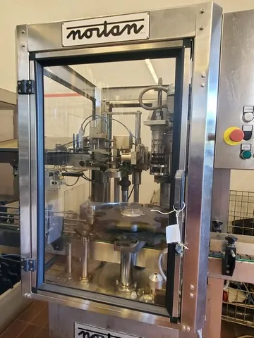 Capsulatrice Nortan Polylaminate